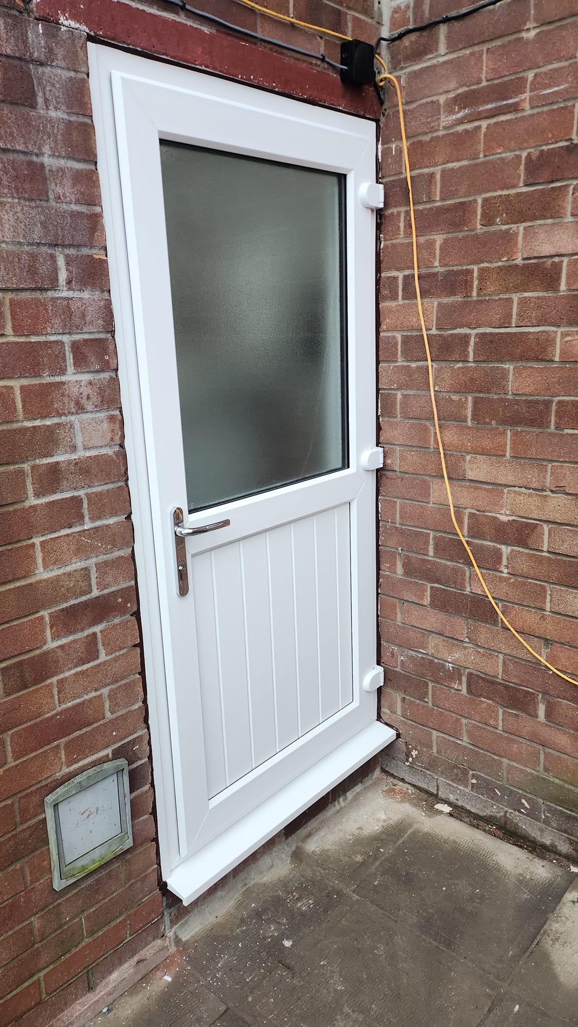 White uPVC stable back door with obscure glazed top panel